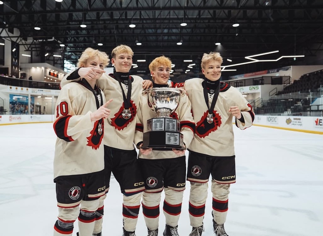 Bigfoot team with trophy
